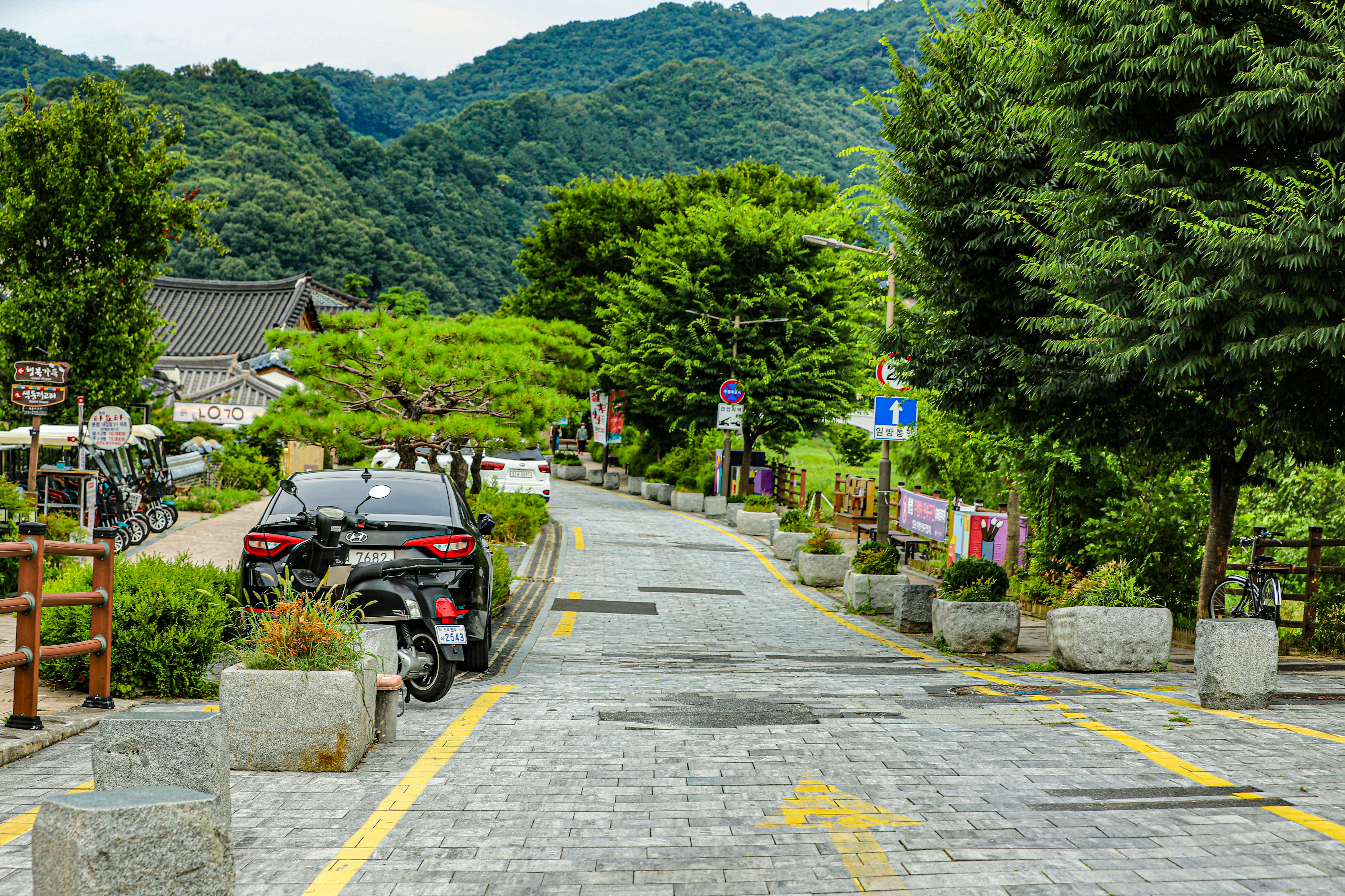 a motorcycle parked on the side of a road