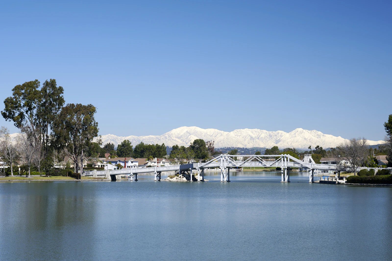 A wide waterway with a bridge in the distance.
