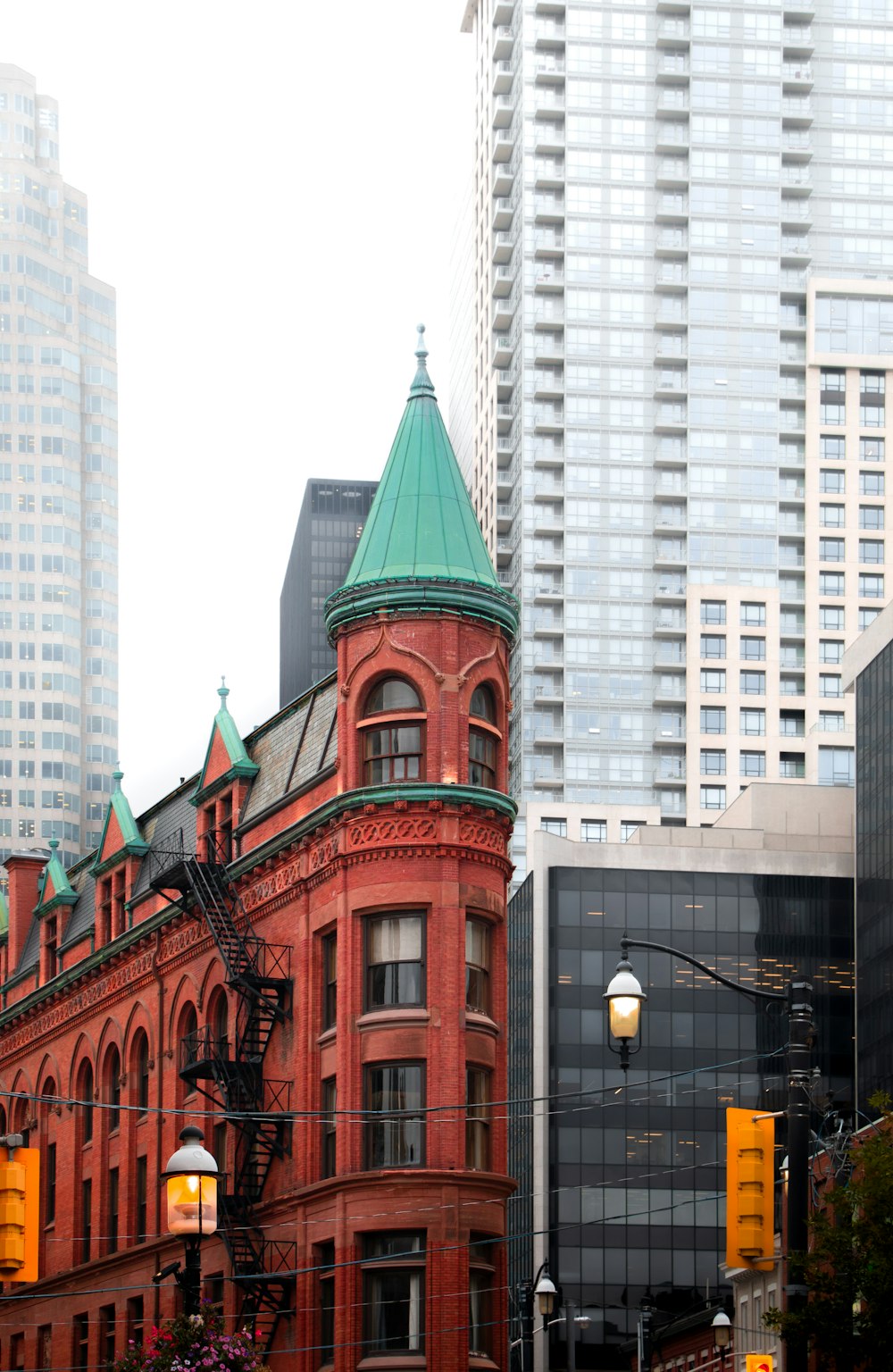 a large red building with a green roof