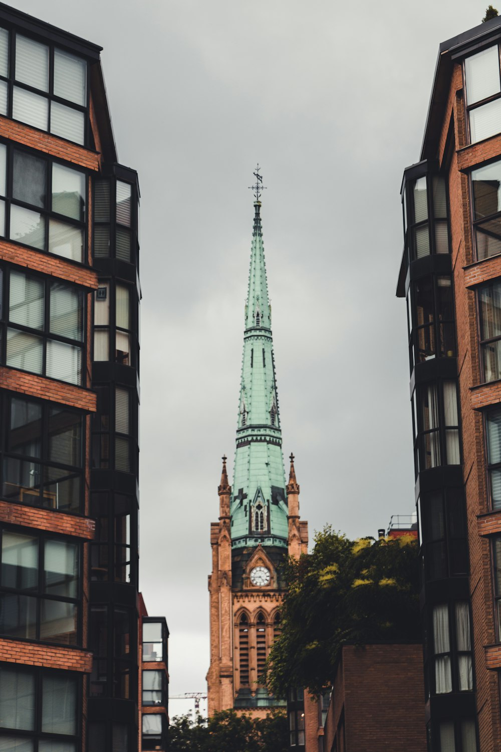 a tall building with a steeple in the background