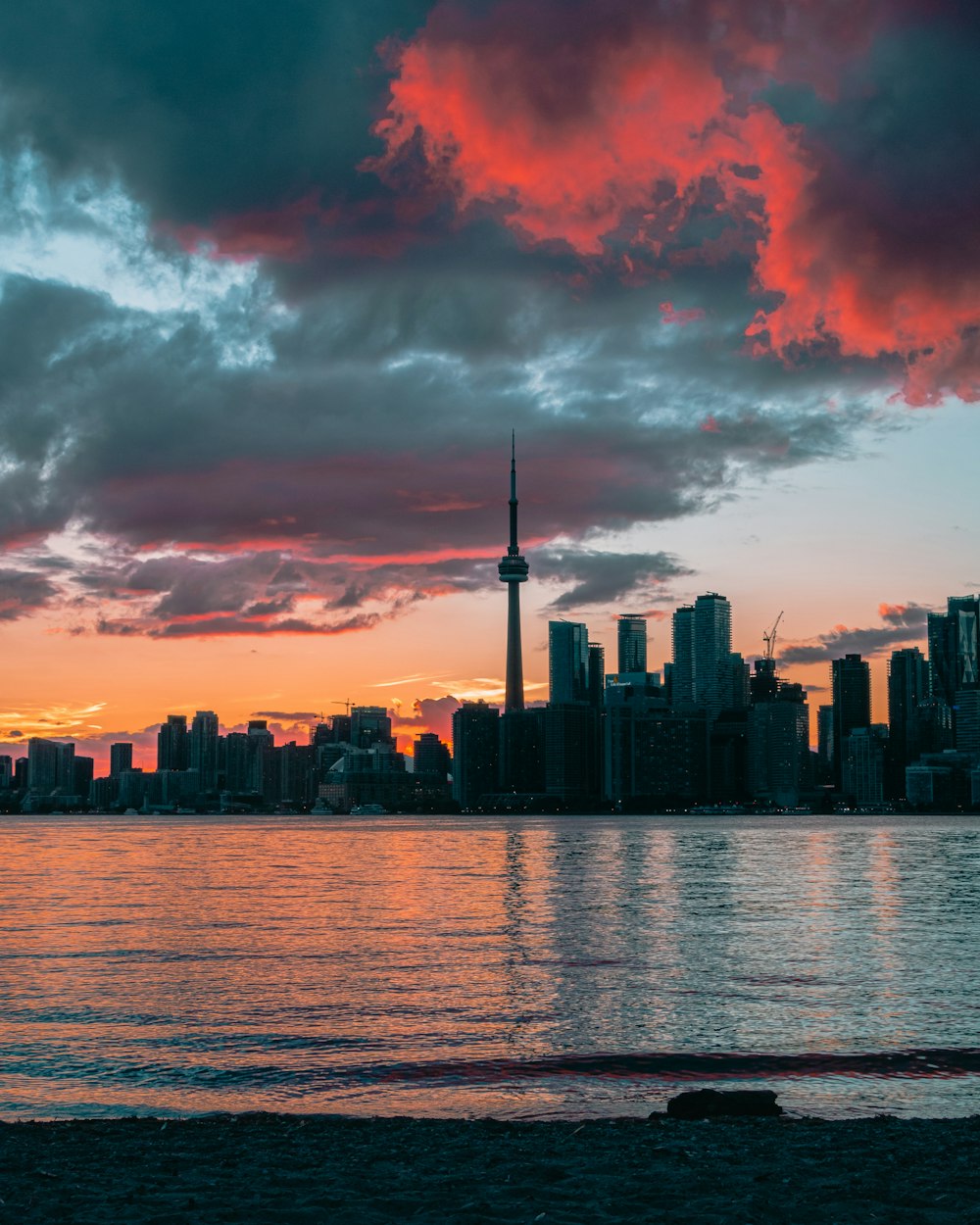 a view of a city skyline at sunset