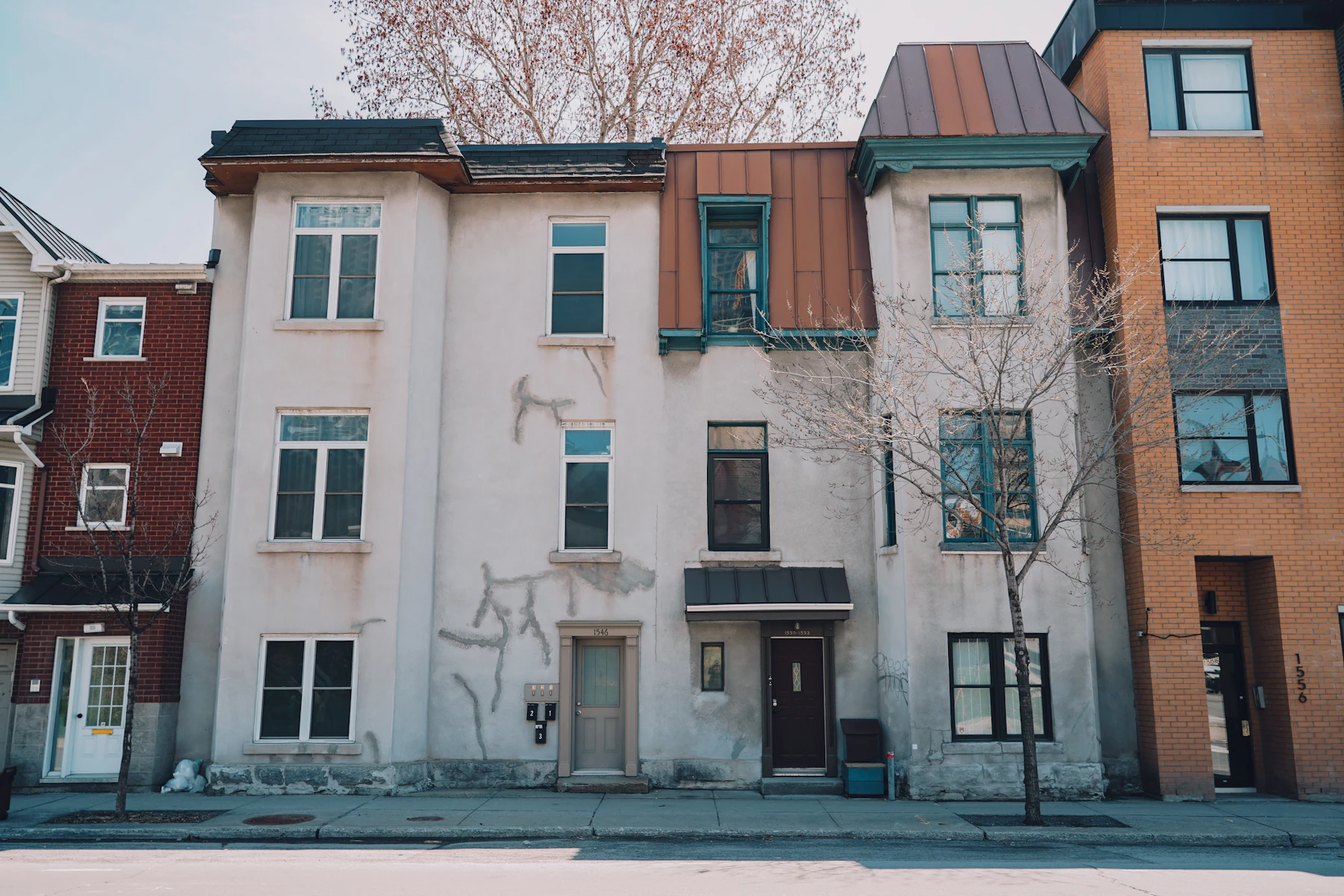 A row of multi-family houses in a Canadian residential area.