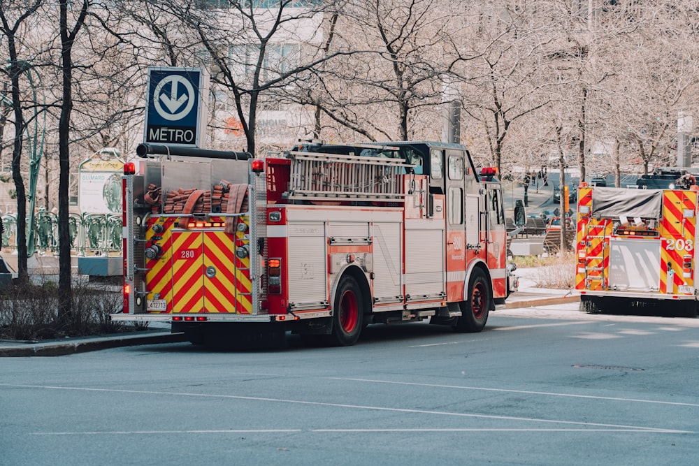 a couple of fire trucks parked next to each other