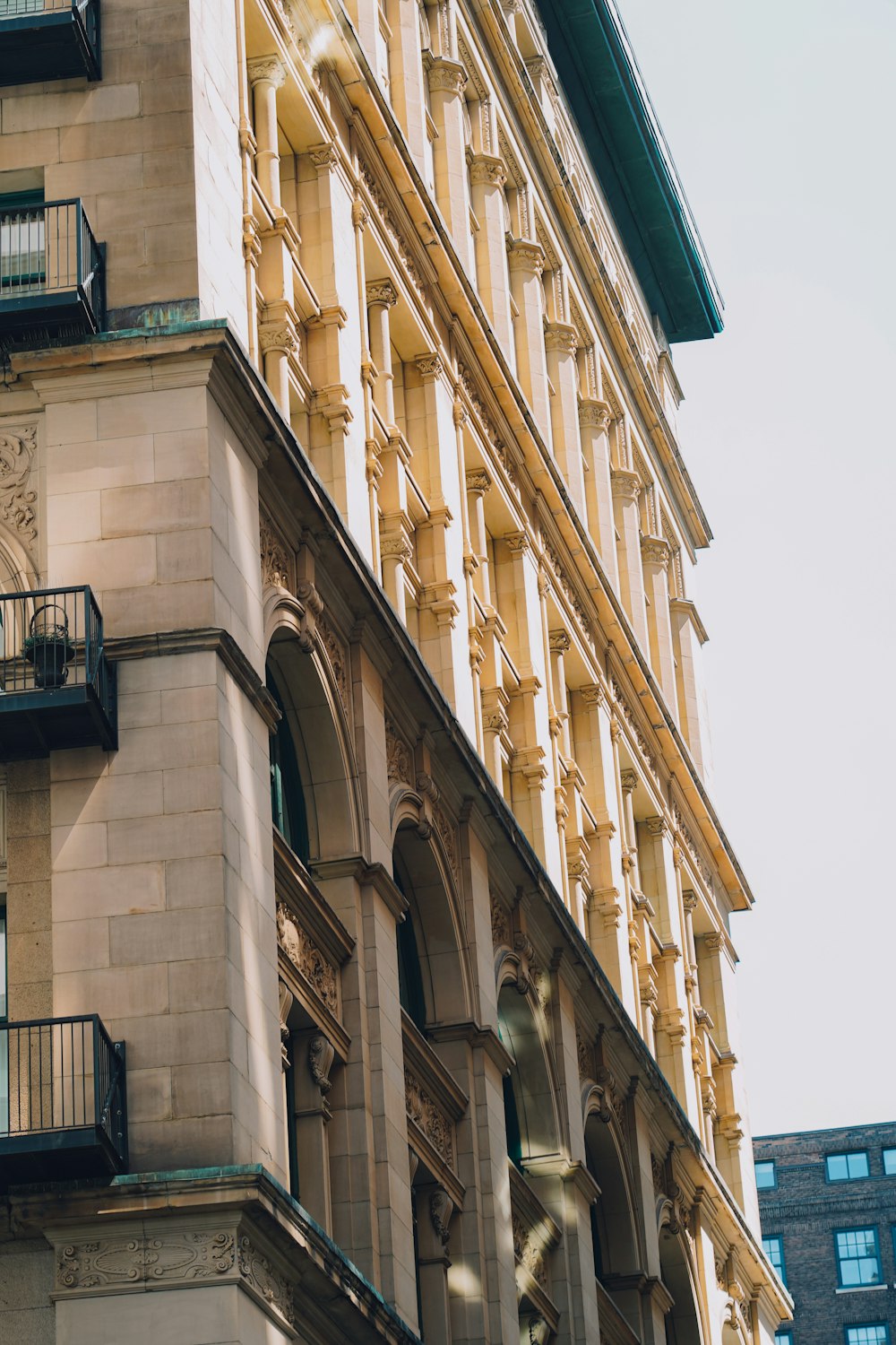 a tall building with a clock on the front of it