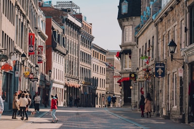 Historic brick buildings of the Harburg city center with bustling shops and cafés on a sunny day.