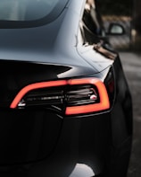 Close-up of the rear design of a modern estate car highlighting its elegant tail lights.