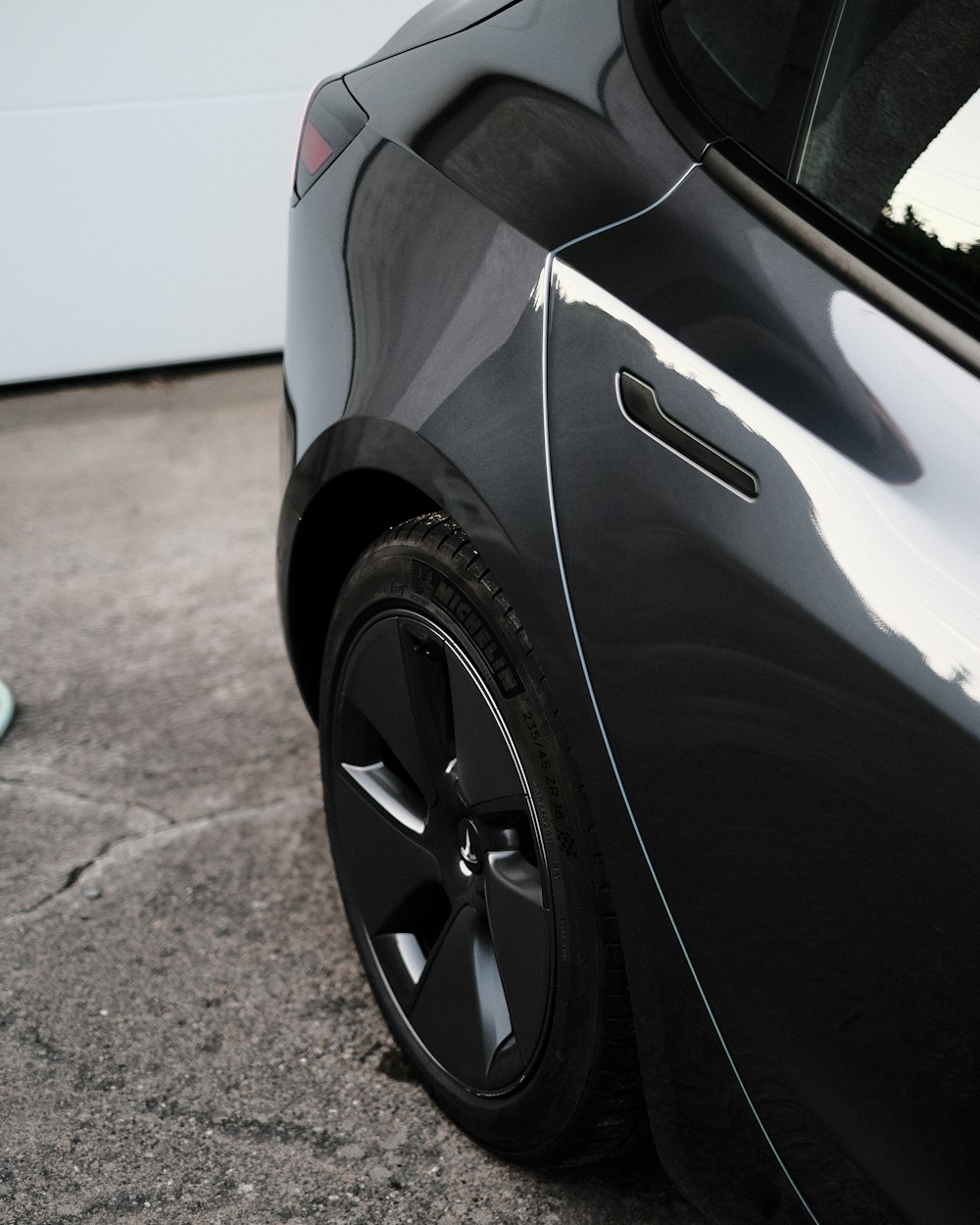 a close up of a car parked in a parking lot