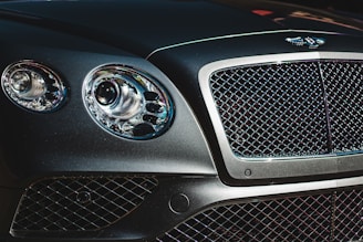 a close up of the front of a black car