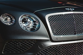 a close up of the front of a black car