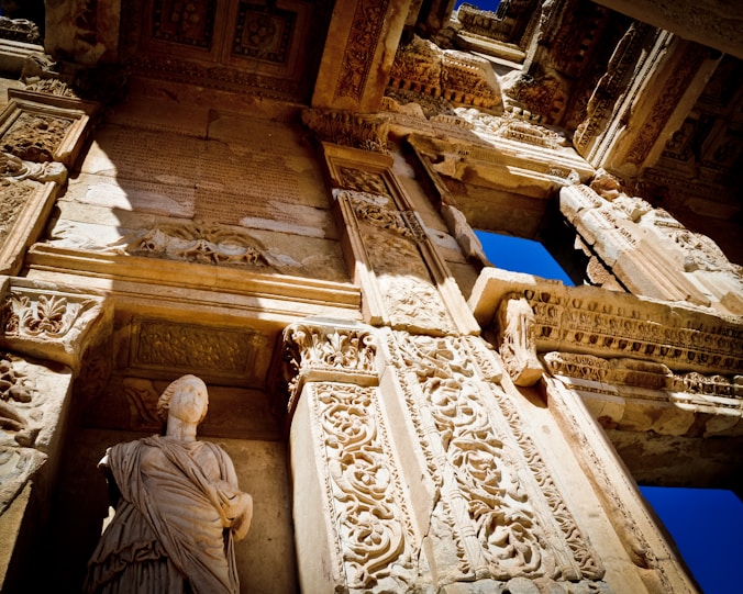 10 Fun Facts about Ephesus in Turkey a statue of a woman standing in front of a building