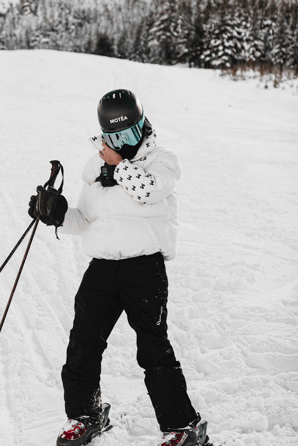 a little girl on skis in the snow