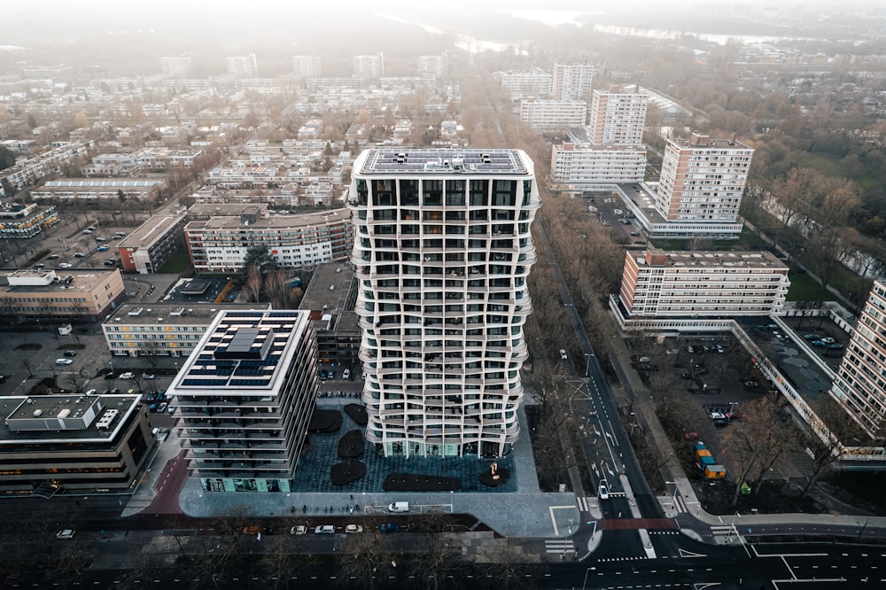 an aerial view of a city with tall buildings