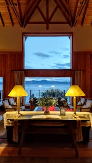Spacious living room opening to a terrace overlooking the sea.