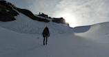 Active hiker ascending Turbacz trail, supported by the sleek hypershell egzoskeleton.