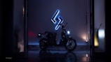 Interior view of the sleek two-wheeled workshop with electric blue lighting accents