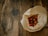 Close-up of a biodegradable carry bag filled with fresh produce on a wooden table.
