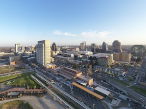A panoramic view of Riyadh's modern skyline blending with traditional Arabian architecture at sunset