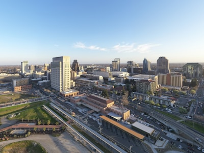 A panoramic view of Riyadh's modern skyline blending with traditional Arabian architecture at sunset
