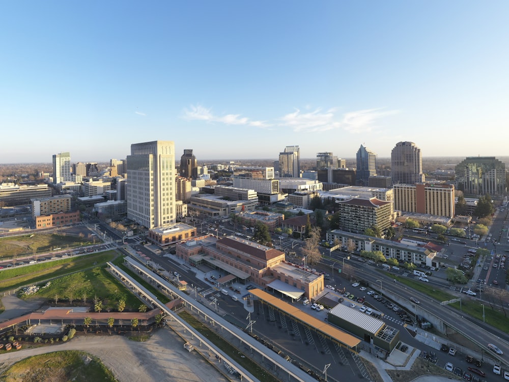 an aerial view of a city with tall buildings