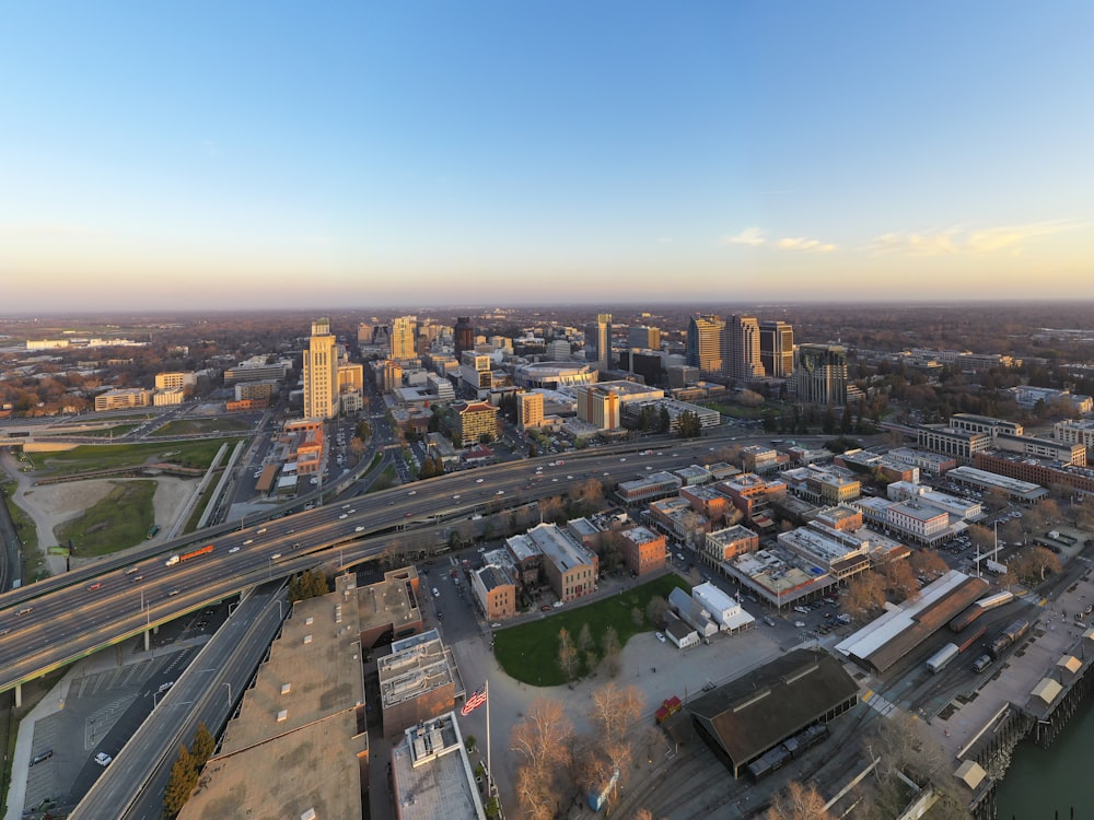 an aerial view of a city with a river running through it