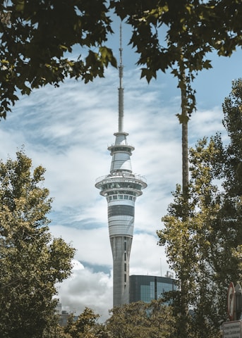 a tall tower with a clock on the top of it