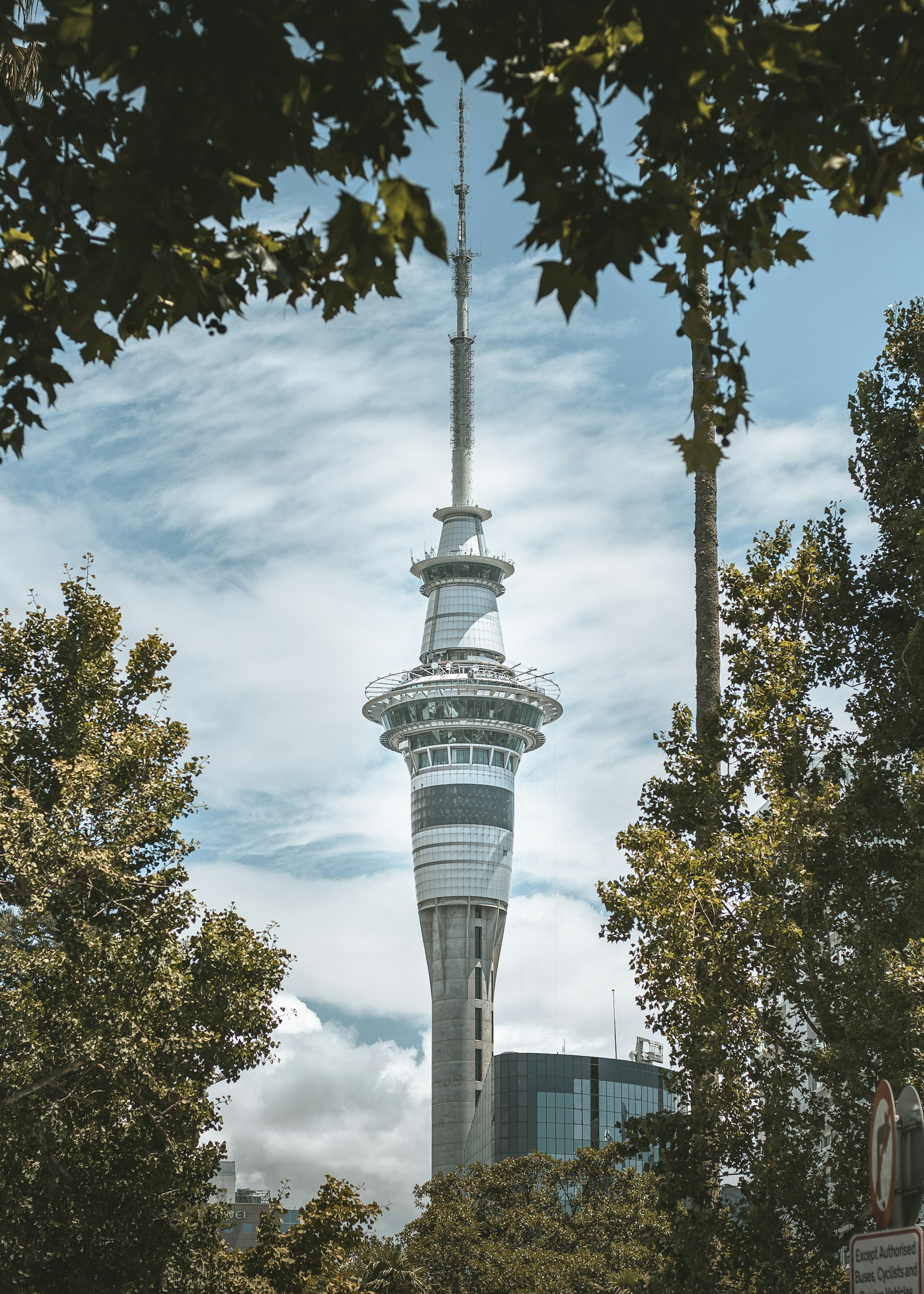 a tall tower with a clock on the top of it