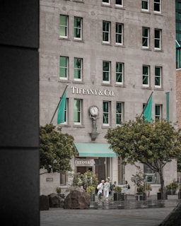 a tall building with a clock on the front of it