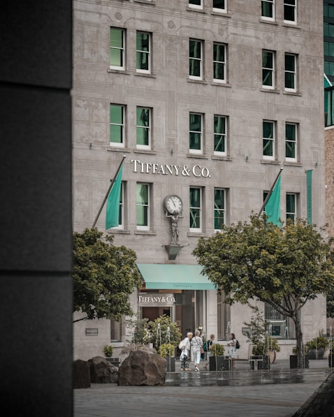 a tall building with a clock on the front of it