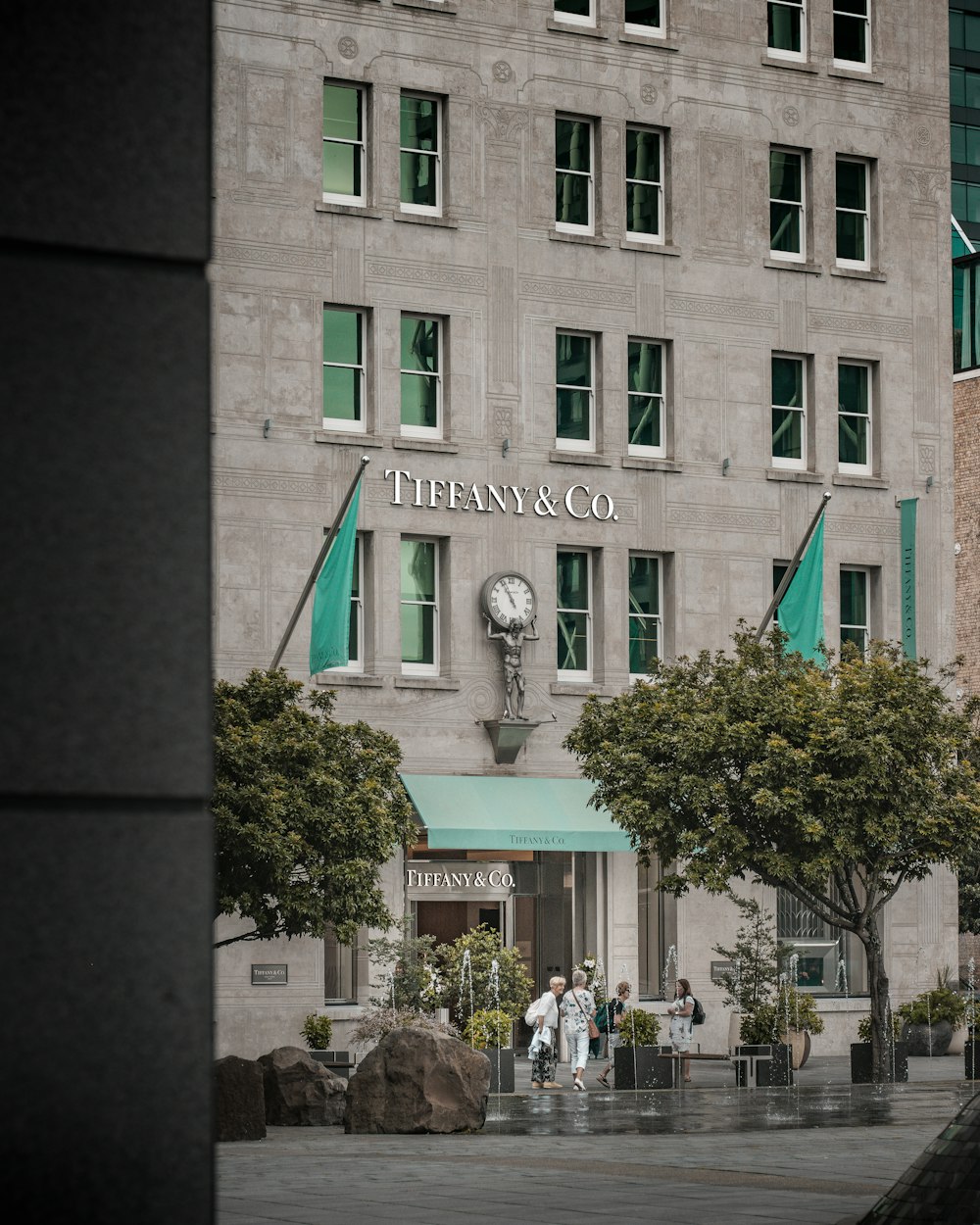 a tall building with a clock on the front of it