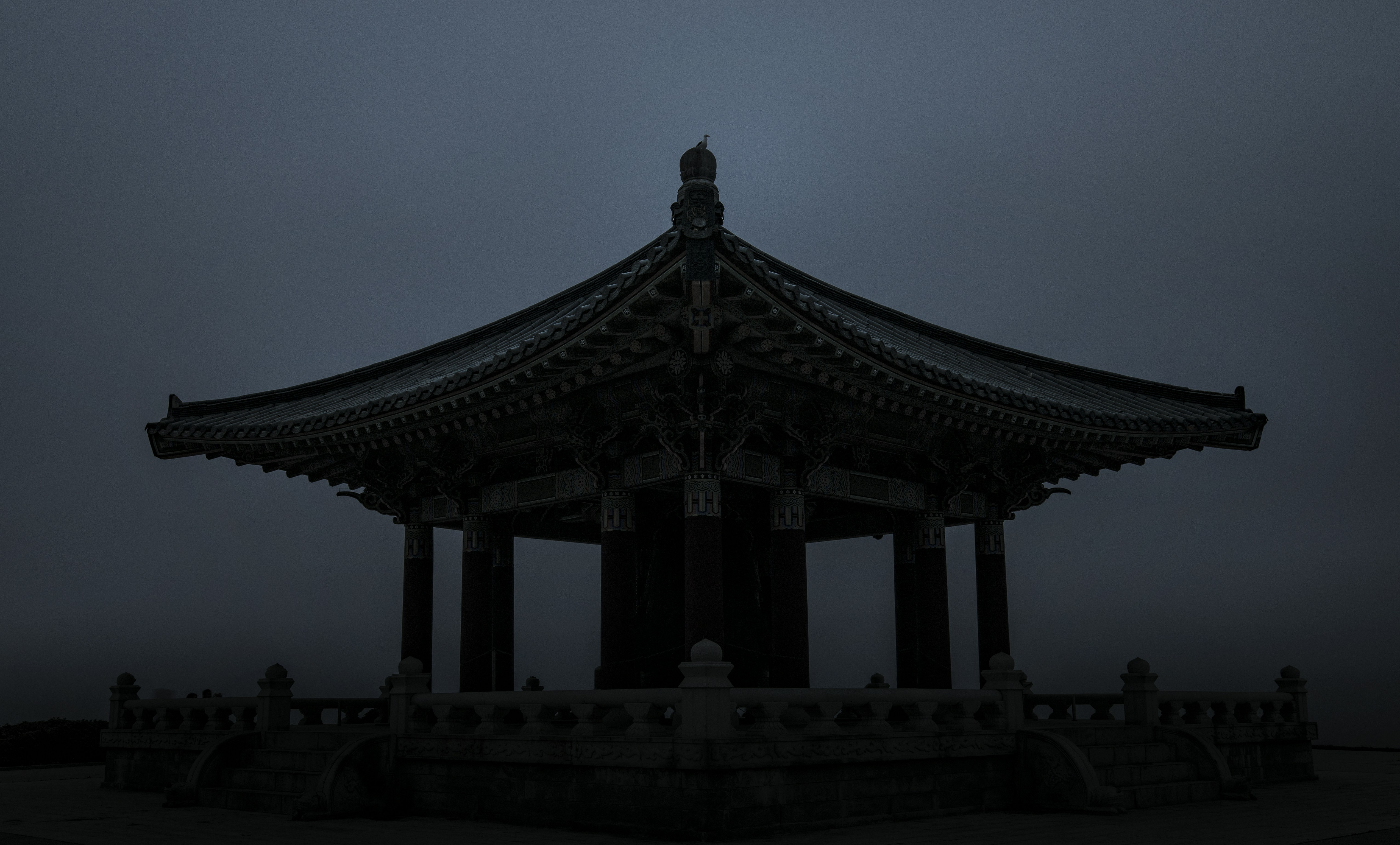 a tall tower with a clock on top of it