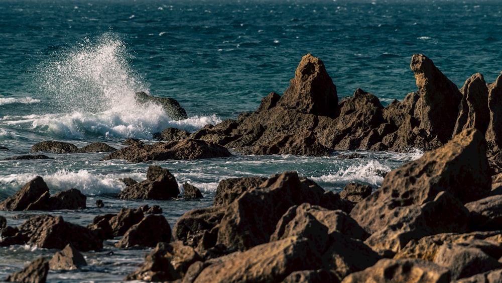 a person riding a surf board on a wave in the ocean