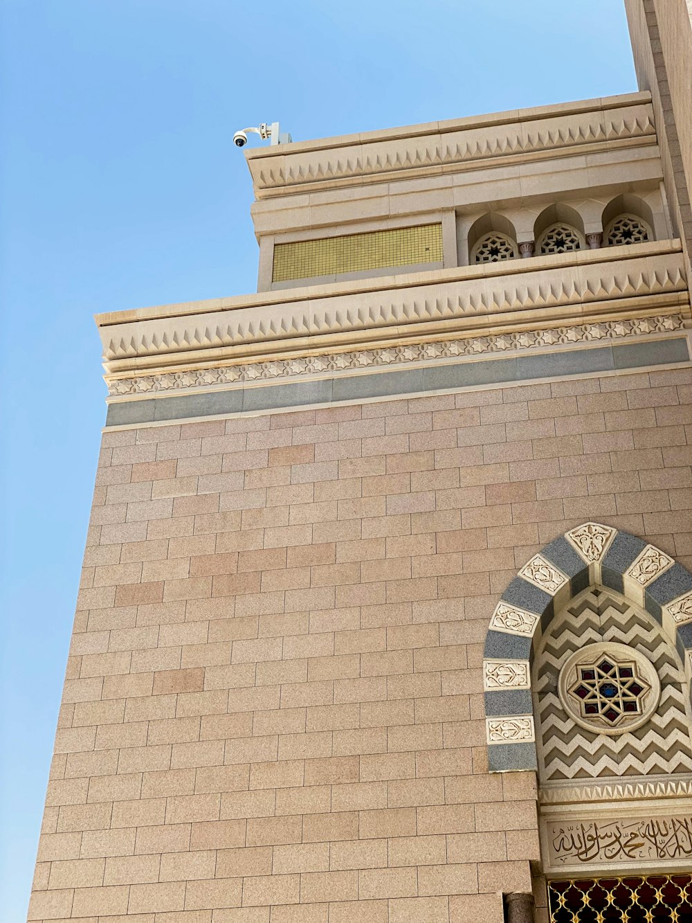 a tall building with a clock on the front of it