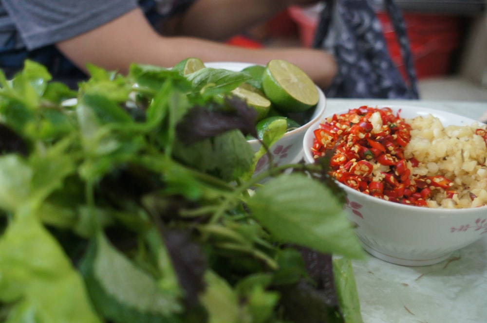 a bowl of food sitting on top of a table