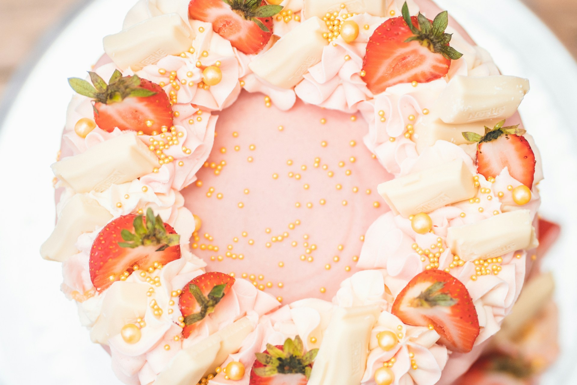 a cake with strawberries on top of it