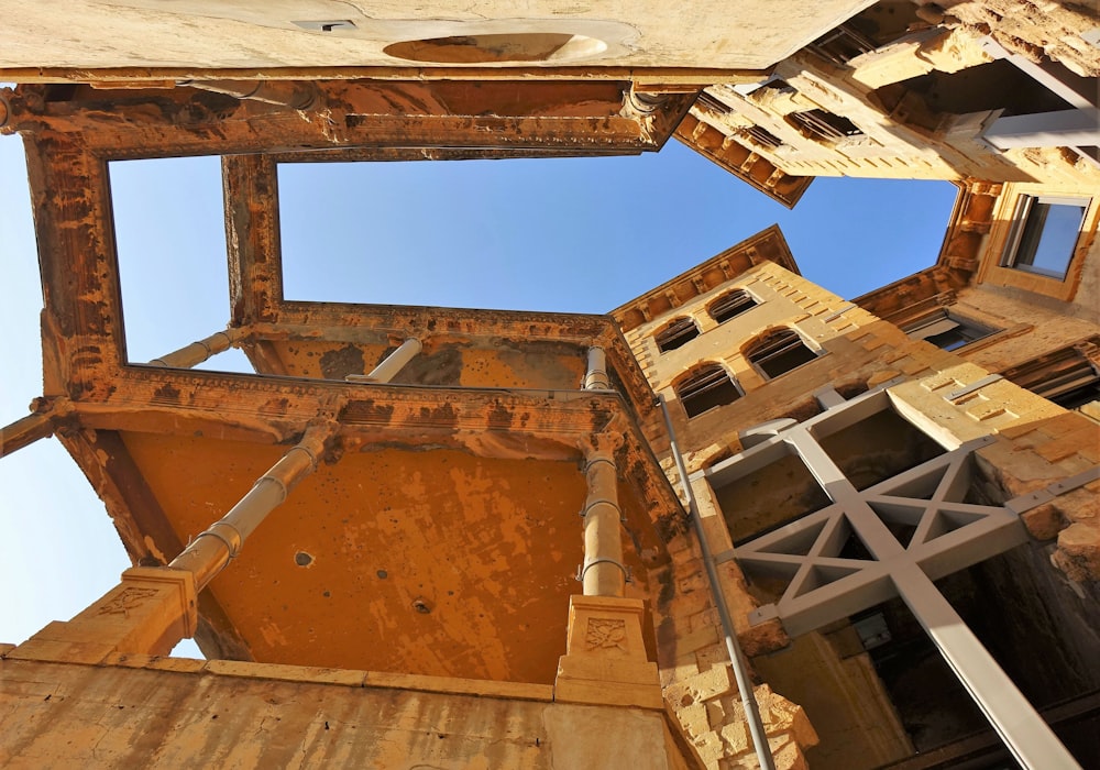 a very old building with a sky in the background