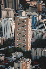 Aerial view of a vibrant city with various apartment buildings.
