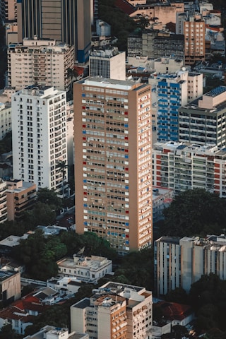 Aerial view of a vibrant city with various apartment buildings.
