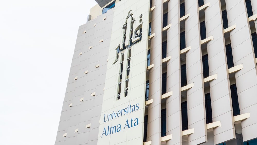 a tall building with a clock on the side of it