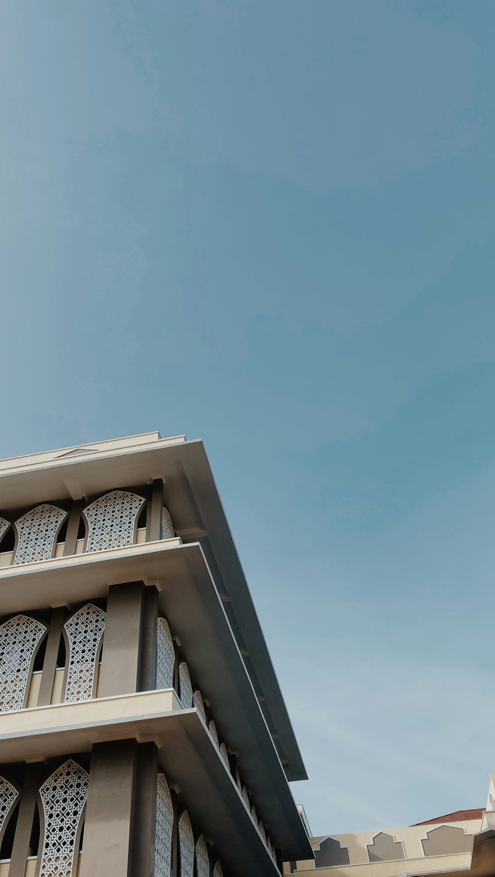 a tall building with a clock on the top of it