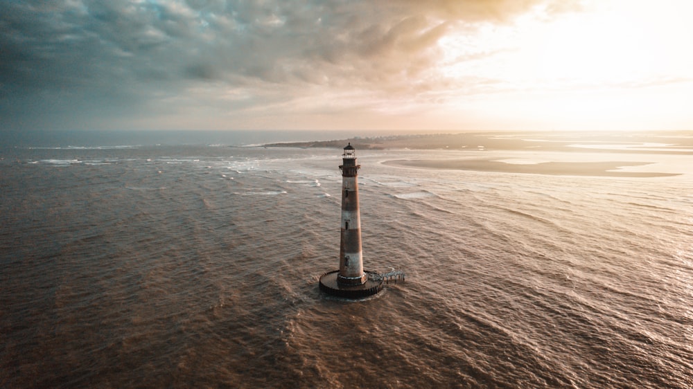 a light house in the middle of the ocean