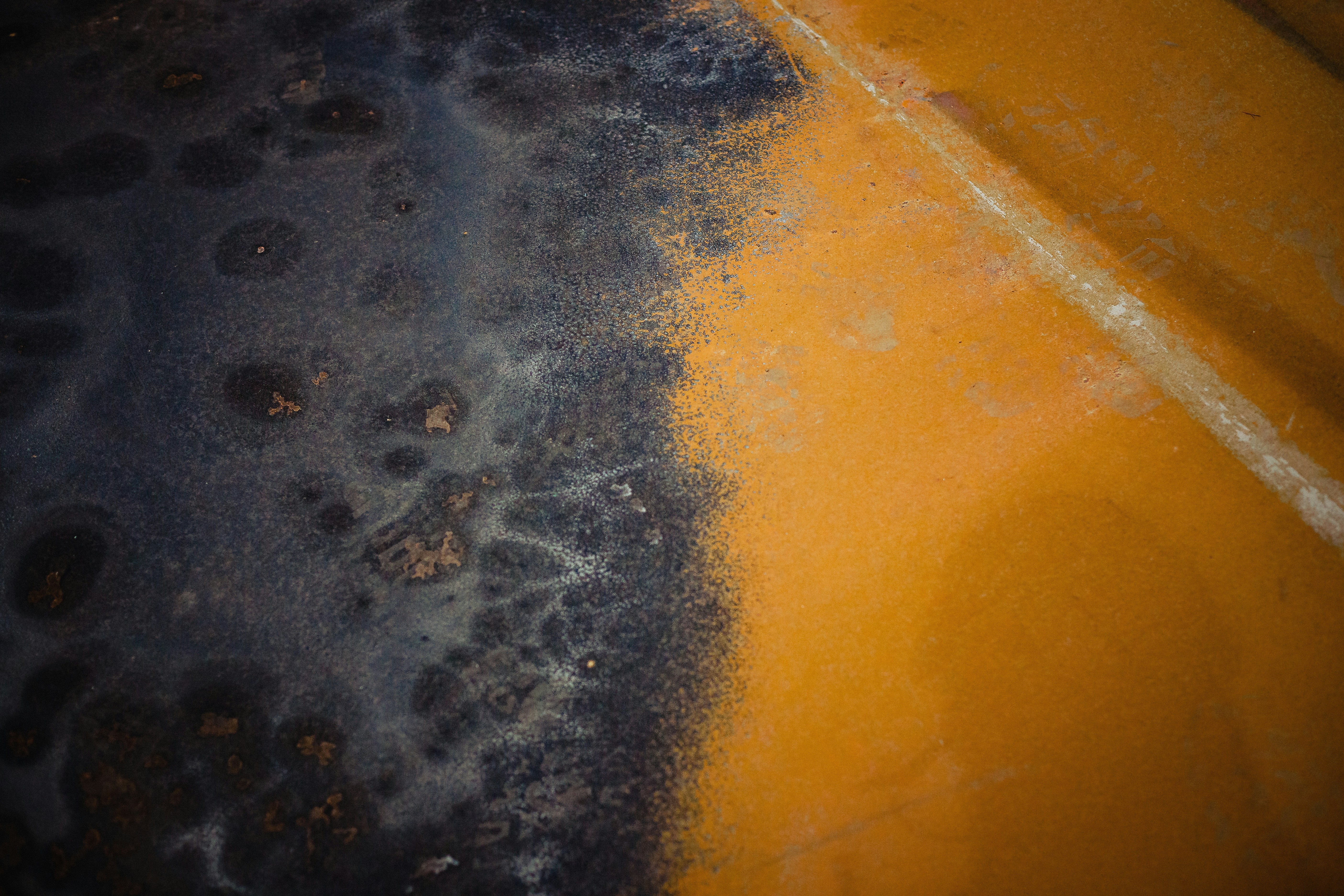 a close up of a yellow and black substance