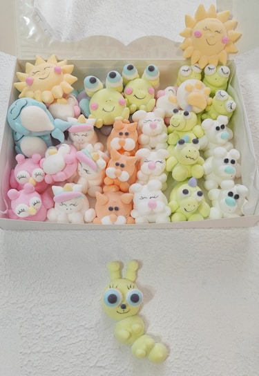 Colorful characters from Misfit Marshmallows navigating a vibrant, whimsical marshmallow world.