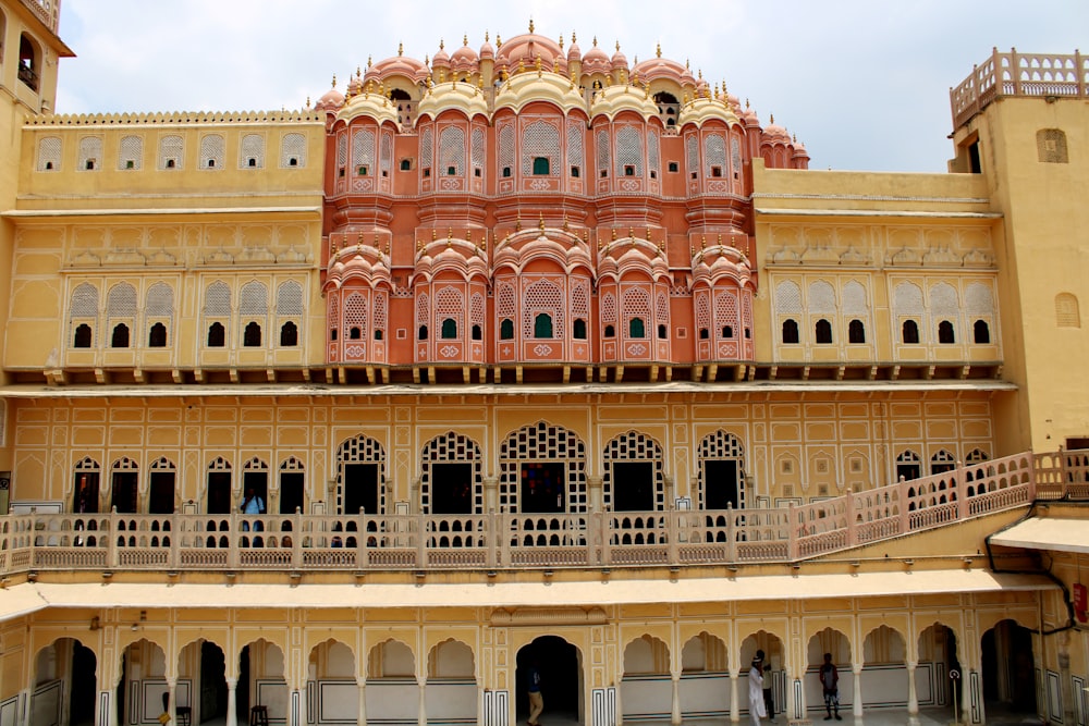 a large building with many windows and balconies