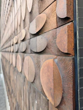 Close-up of decorative wood effect painting applied to interior walls in a local store.