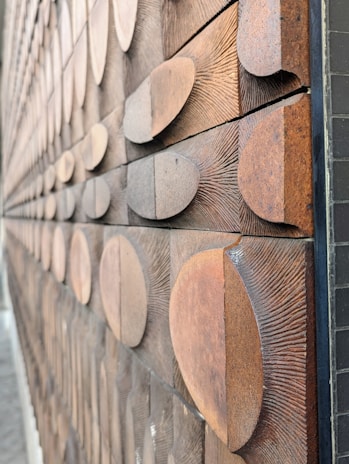 Close-up of textured fluted panels installed on a stylish living room wall.