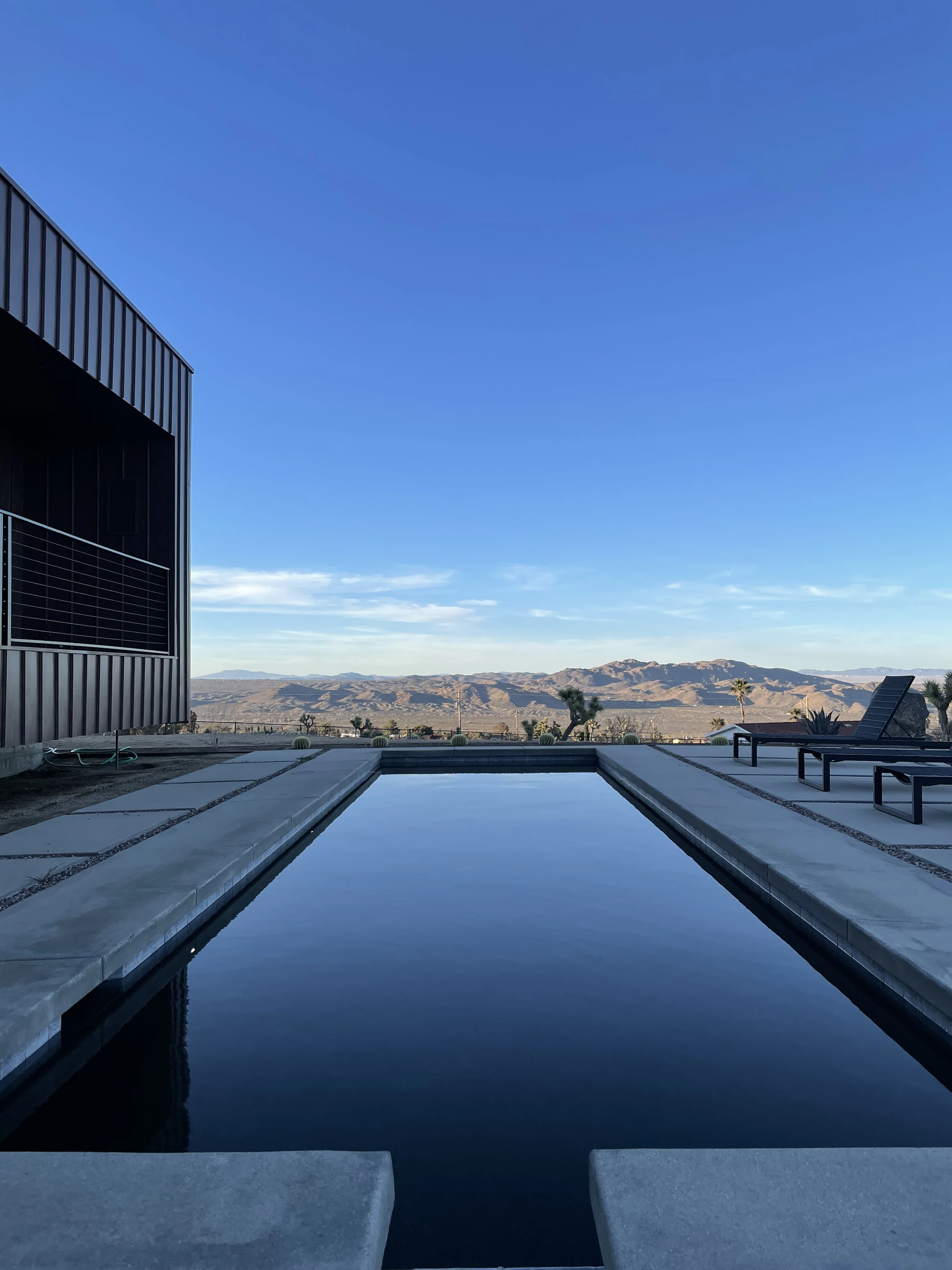 Refined desert residence with a long pool