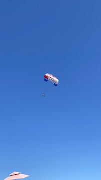 A thrilling parasail ride over the ocean waves.