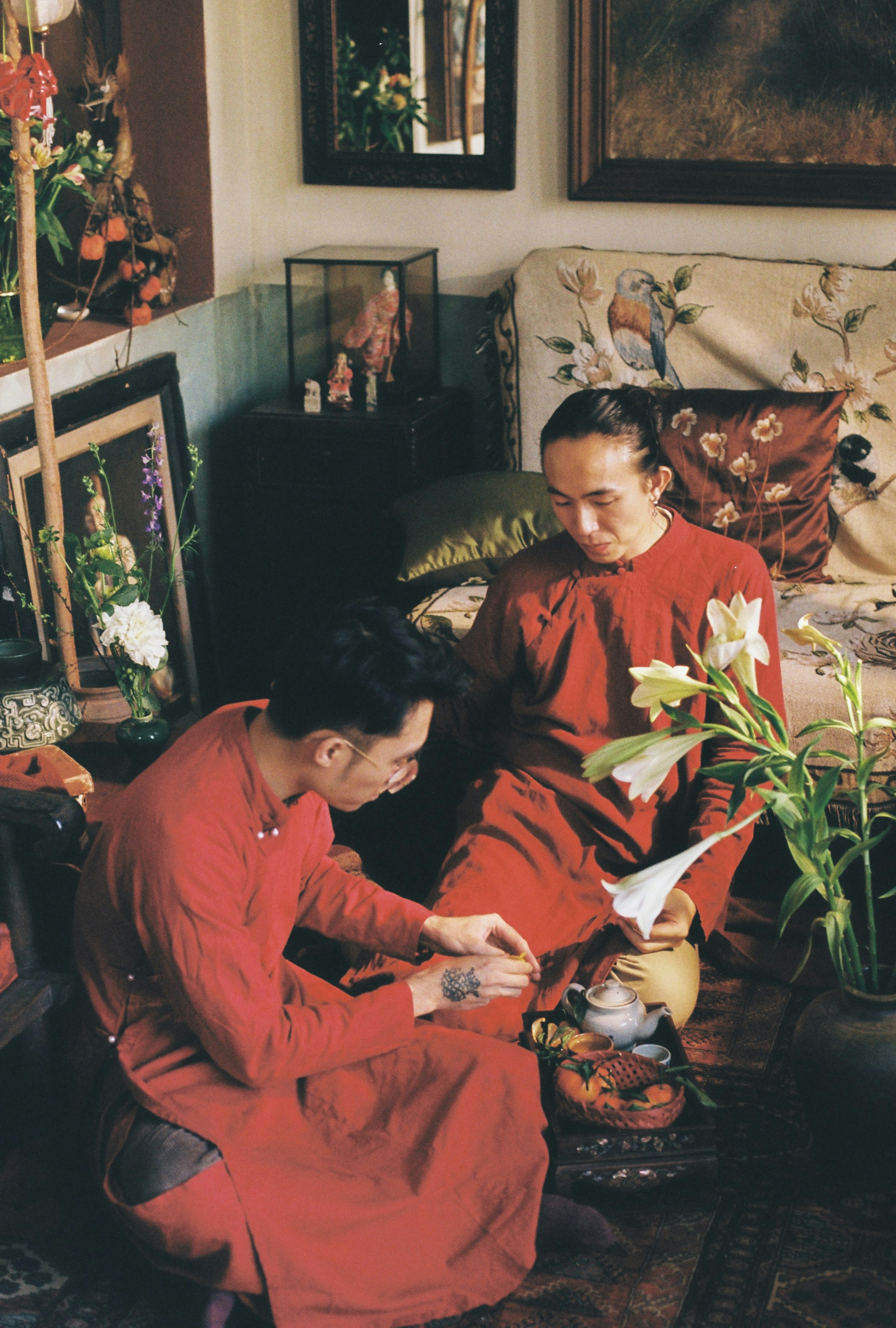 a couple of people sitting on a couch