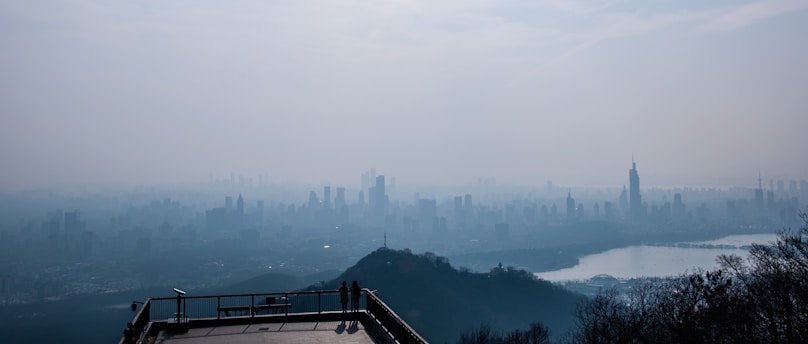 a view of a city from a hill