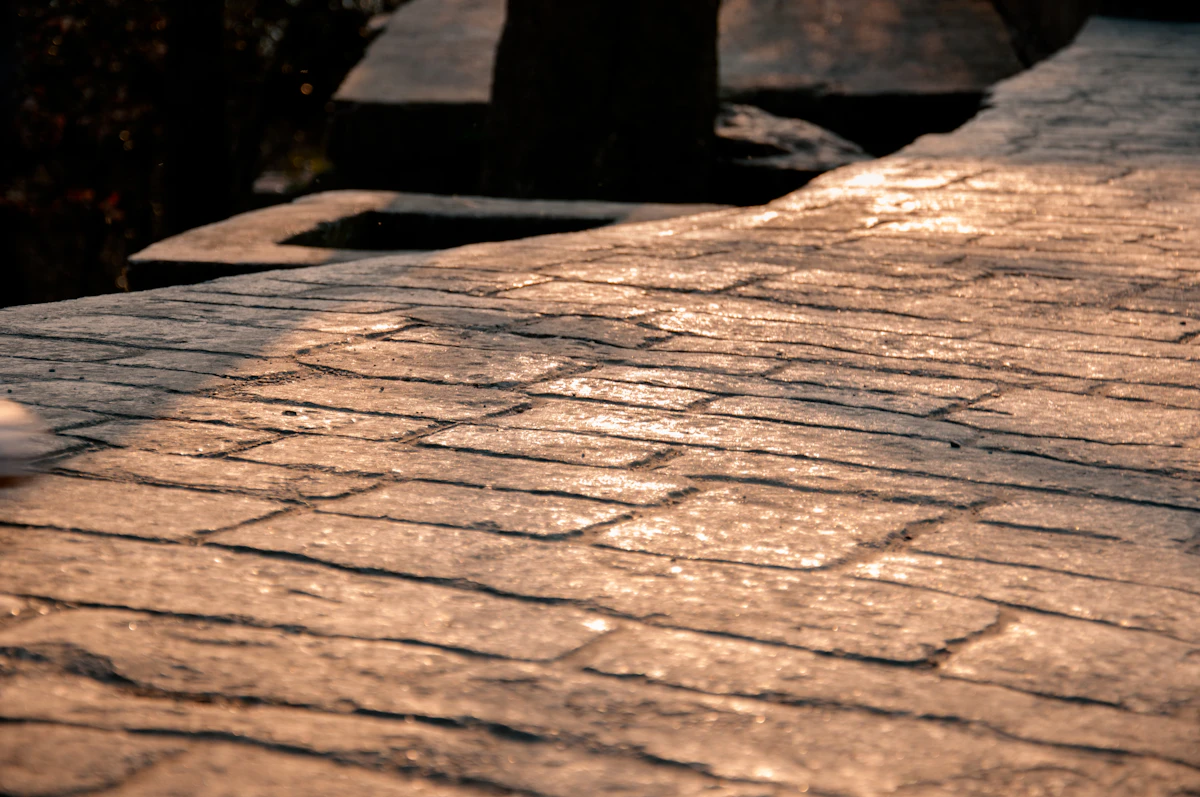 A stamped decorative concrete finish, laid in a natural stone pattern